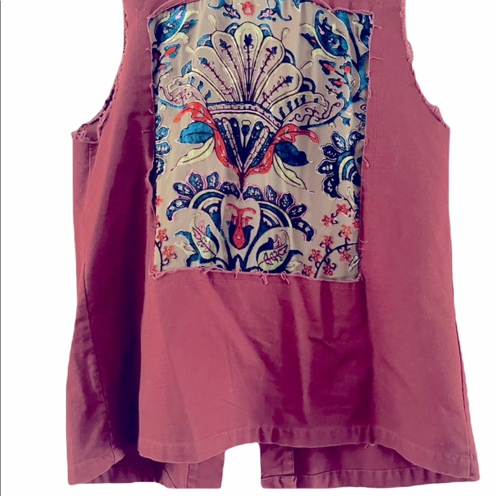 NWOT. BUCKLE  burgundy vest w/ embroidered suede back detail.